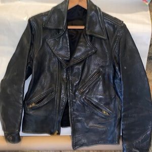 Size:medium, vintage black leather jacket, slightly worn, from an estate sale